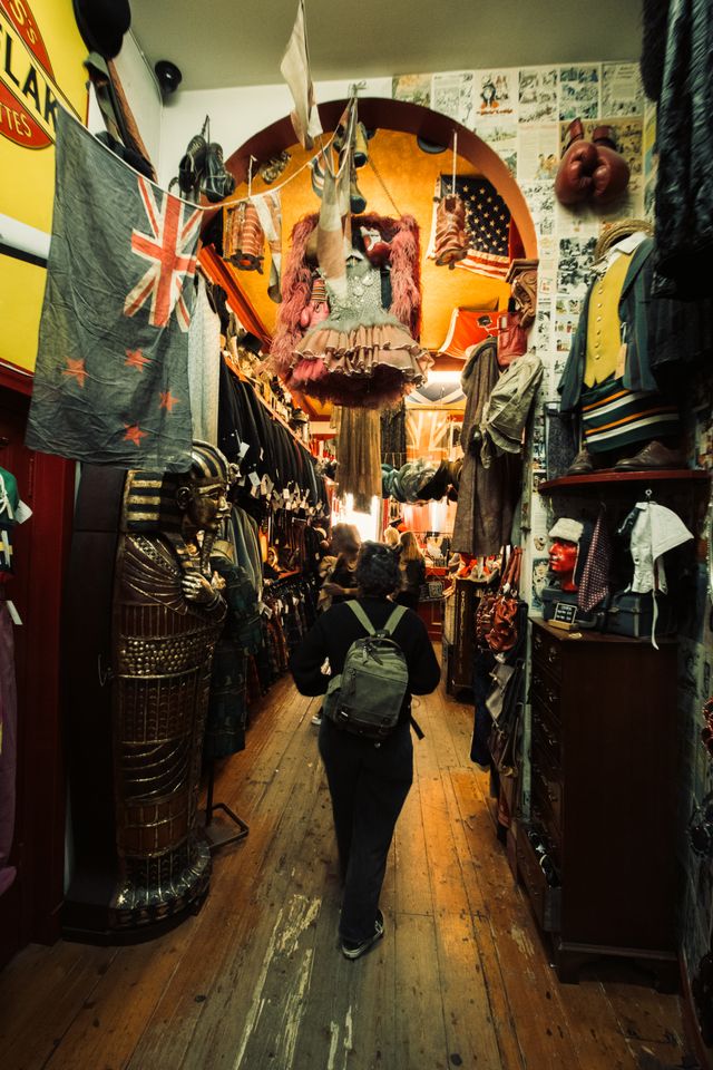A second hand clothes shop highly decorated from the floor to the ceiling