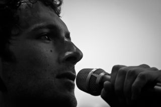 Black and white close up of Aaron's singer